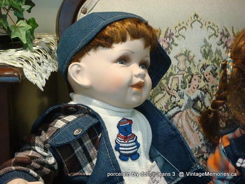 Porcelain boy doll in jeans