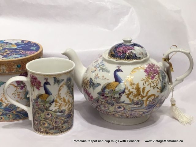 Porcelain teapot and cup mugs with Peacock